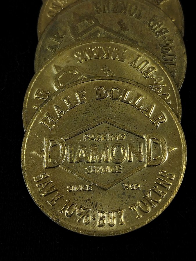 DIAMOND PARKING TOKENS INCLUDING OLD VELVET BAG
