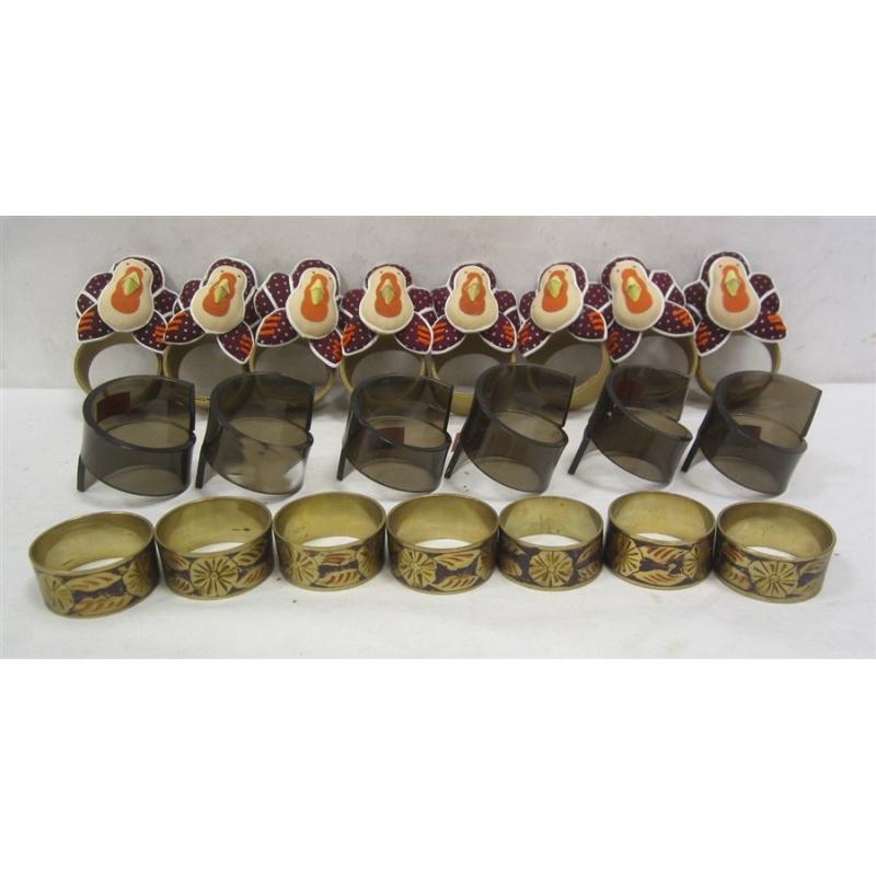 THREE SETS OF NAPKIN RINGS: LUCITE, BRASS AND CLOTH TURKEYS