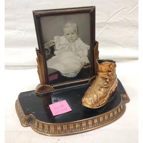 BRONZED BABY SHOE AND STAND, OLD FRAME ADDED