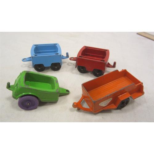 FOUR VINTAGE TOOTSIE TOY TRAILERS