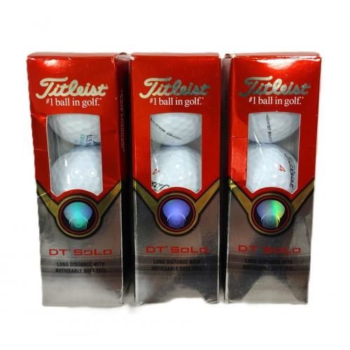 THREE BOXES OF TITLEIST GOLF BALLS