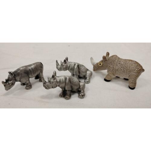 THREE PEWTER AND ON LEAD SMALL HIPPOS