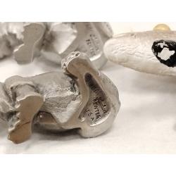 THREE PEWTER AND ON LEAD SMALL HIPPOS