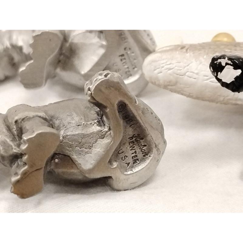 THREE PEWTER AND ON LEAD SMALL HIPPOS