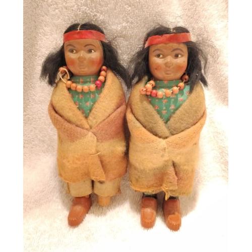 TWO CELLULOID/WOOD SKOOKUM DOLLS