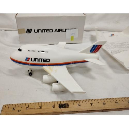 UNITED AIRLINES PLASTIC AIRPLANE BANK WITH BOX