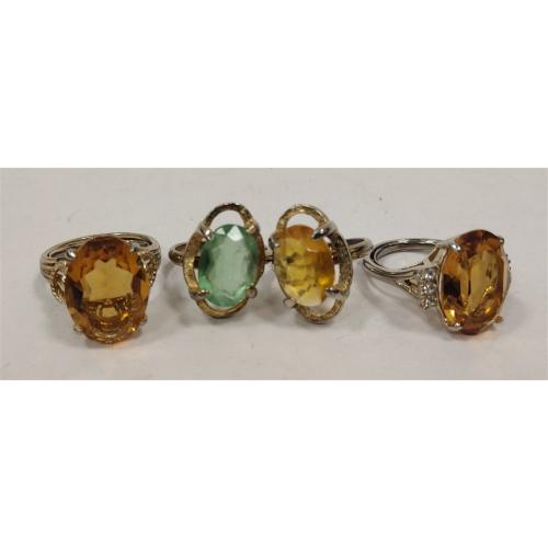 FOUR COSTUME JEWELRY RINGS