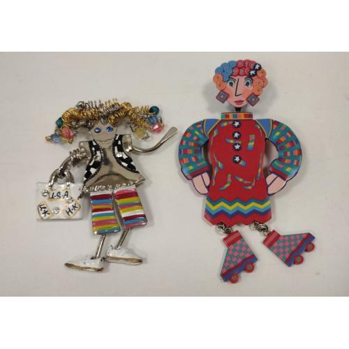 TWO LADY PINS INCLUDING GANZ ENAMELED