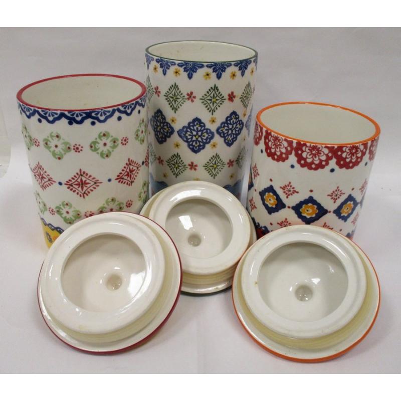 THREE GRADUATED SIGNATURE PORCELAIN CANNISTERS