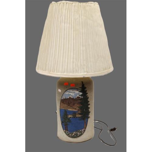 STUDIO POTTERY LAMP WITH RELIEF LANDSCAPE SCENE.  SIGNED "ROBERT"