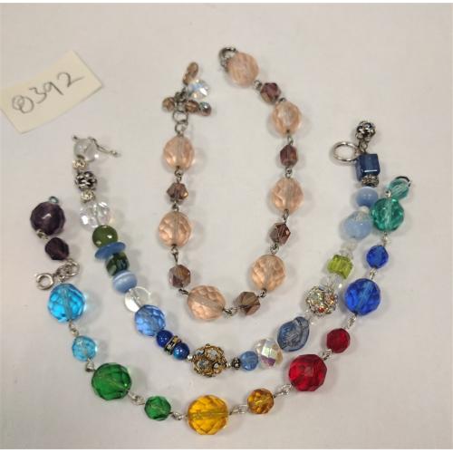 THREE FACETED GLASS BRACELETS