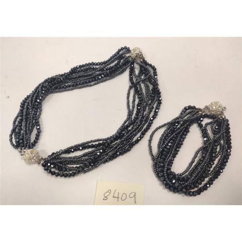 NEWER MULTI STRAND COSTUME JEWELRY PIECE