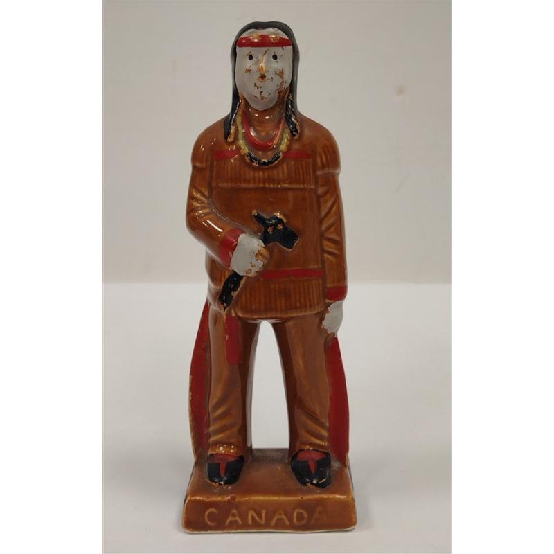 20TH CENTURY CANADA CERAMIC "INDIAN" SOUVENIR FIGURE.