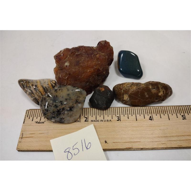 COLLECTION OF POLISHED STONES AND ONE RAW CARNELAIN