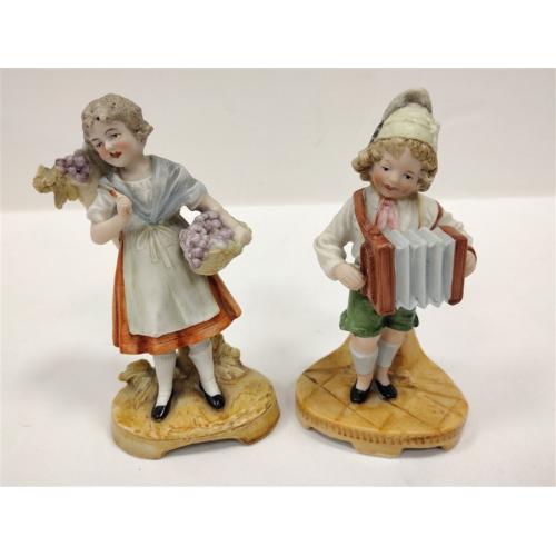 TWO VINTAGE GERMAN BISQUE FIGURAL VASES