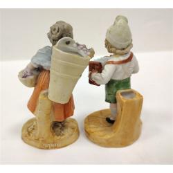 TWO VINTAGE GERMAN BISQUE FIGURAL VASES