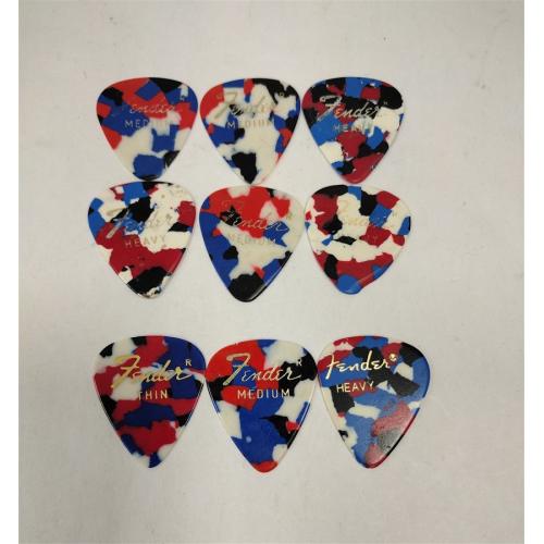 NINE VINTAGE FENDER GUITAR PICKS