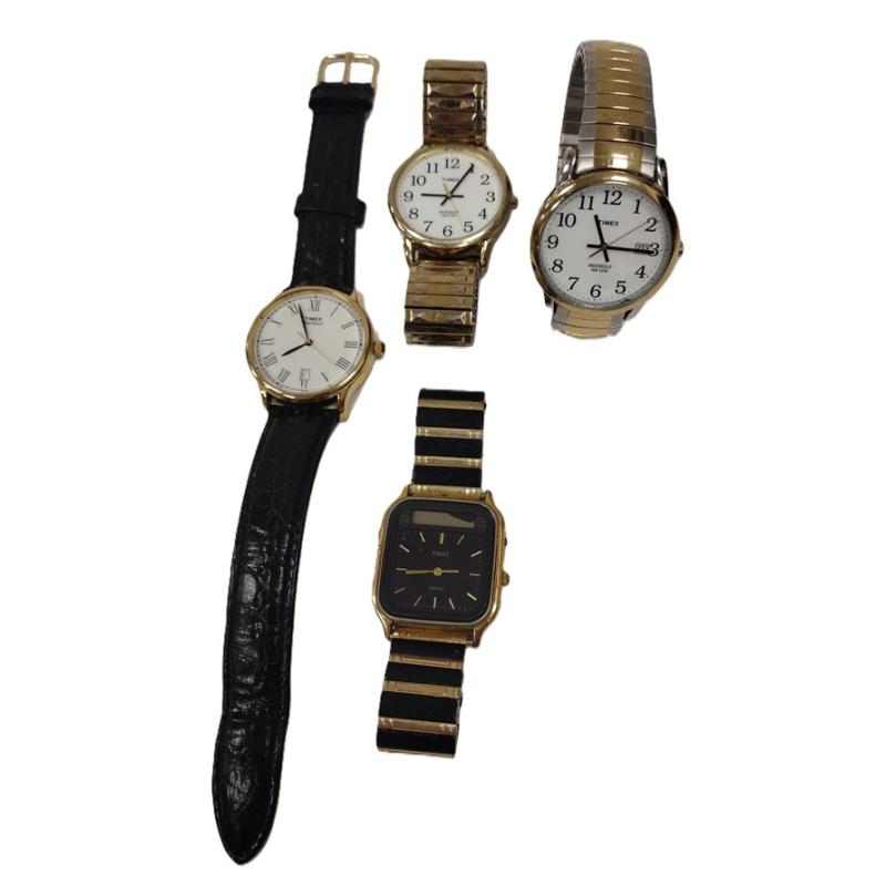 FOUR VINTAGE TIMEX WATCHES