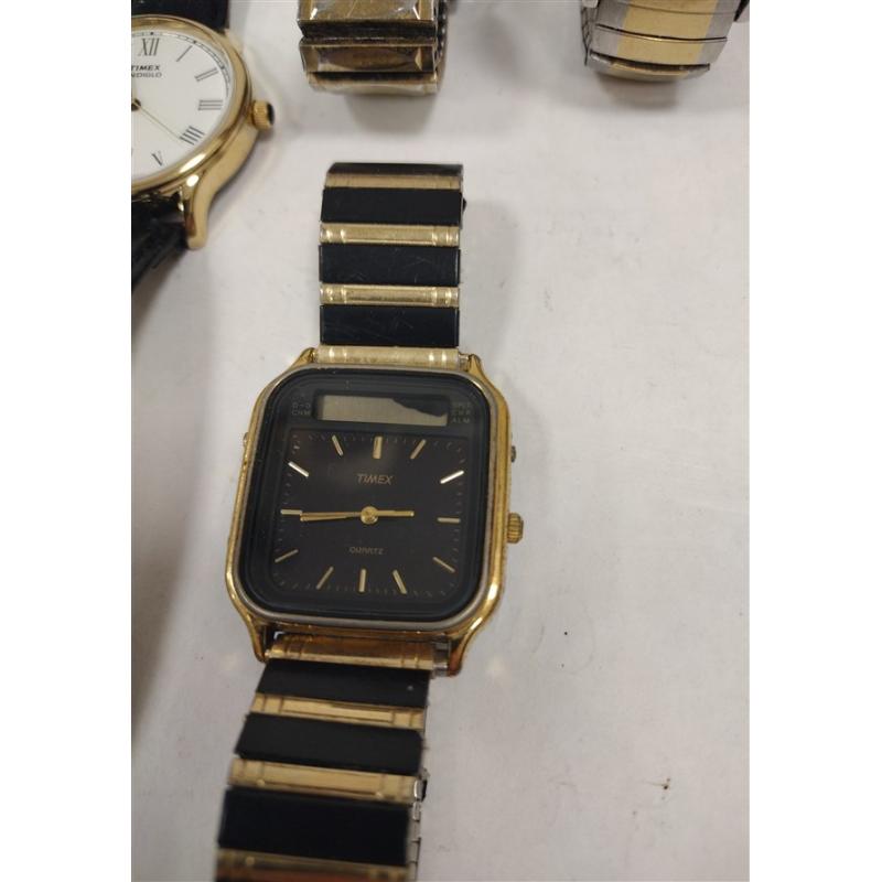 FOUR VINTAGE TIMEX WATCHES