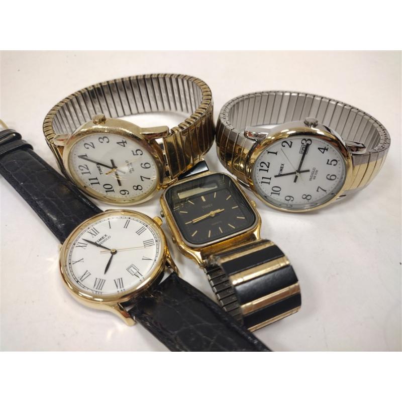 FOUR VINTAGE TIMEX WATCHES