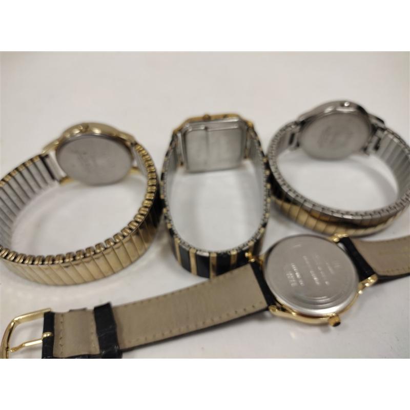 FOUR VINTAGE TIMEX WATCHES