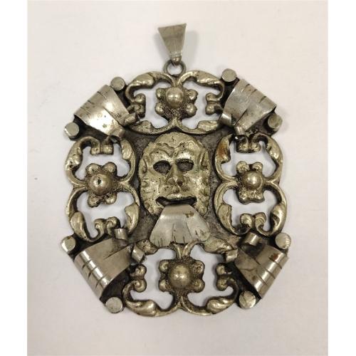 ITALIAN CAST METAL GROTESQUE MASK PENDANT