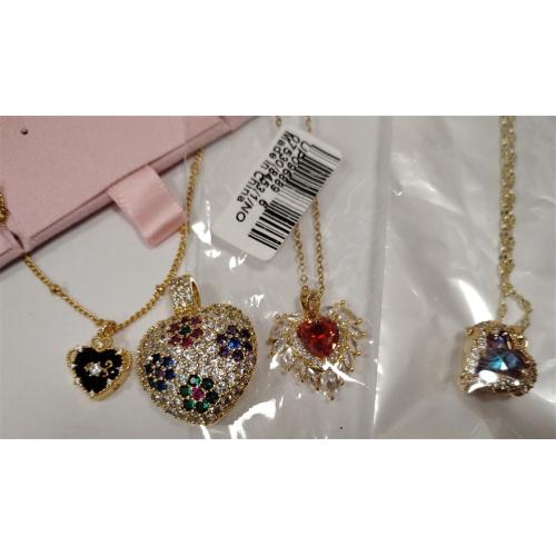 FOUR CONTEMPORARY EMBELLISHED HEART SHAPED PENDANTS