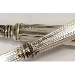 TWO ANTIQUE STERLING HANDLED SERVING SPOONS