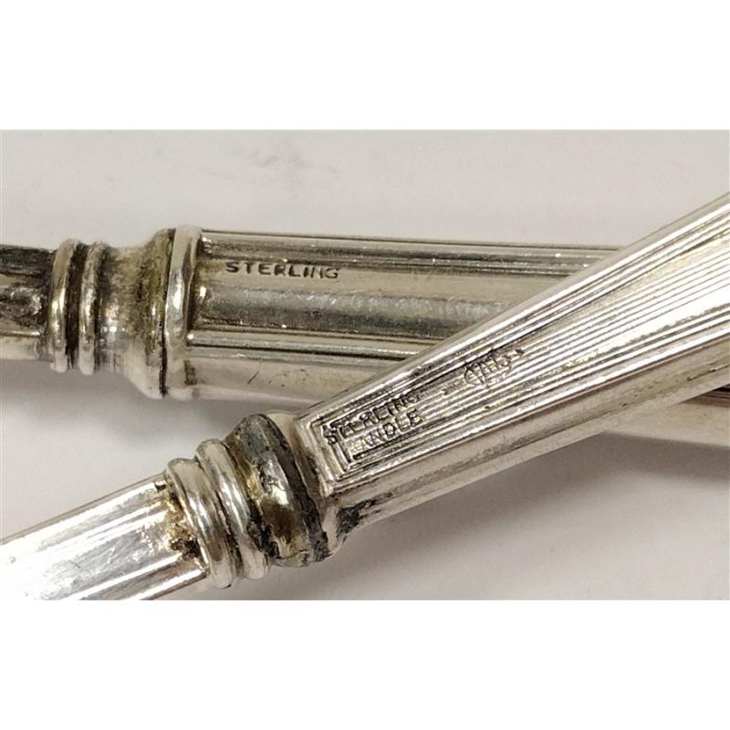 TWO ANTIQUE STERLING HANDLED SERVING SPOONS
