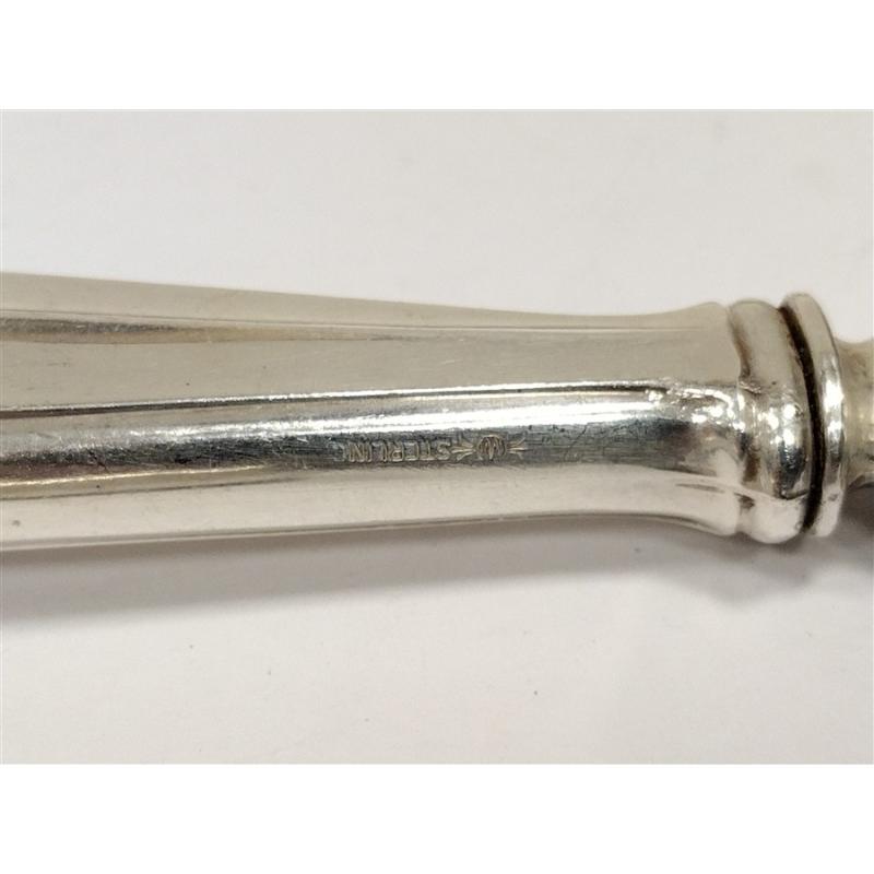 TWO ANTIQUE STERLING HANDLED SERVING SPOONS