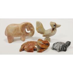 FOUR MINIATURE STONE ANIMALS
