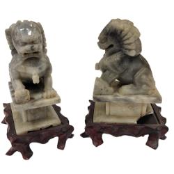 PAIR OF ANTIQUE STONE FOO LIONS WITH WOOD STANDS, one broken