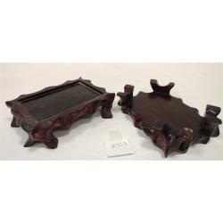 PAIR OF ANTIQUE STONE FOO LIONS WITH WOOD STANDS, one broken