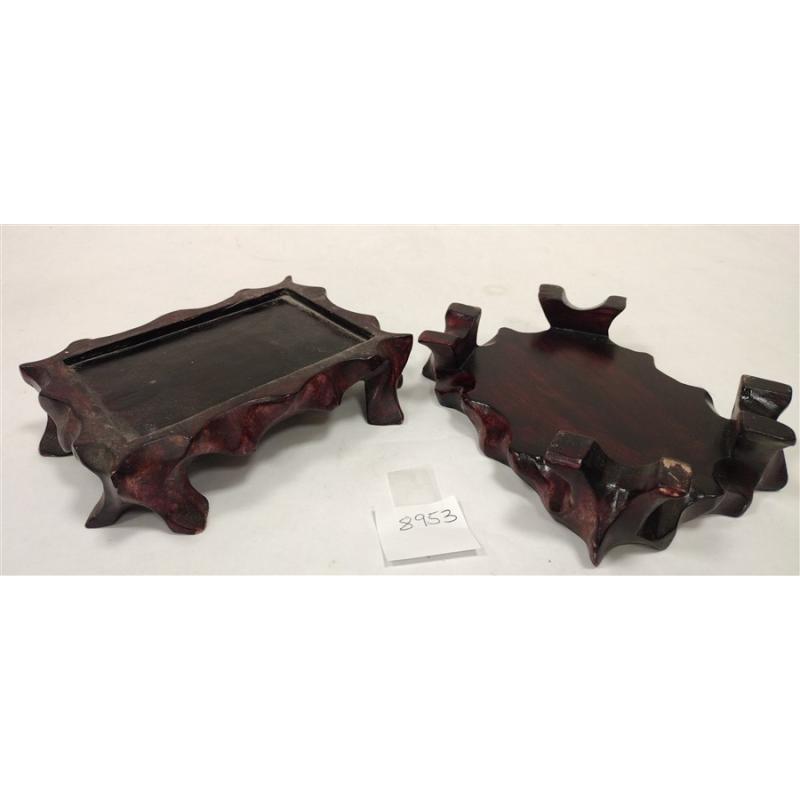 PAIR OF ANTIQUE STONE FOO LIONS WITH WOOD STANDS, one broken