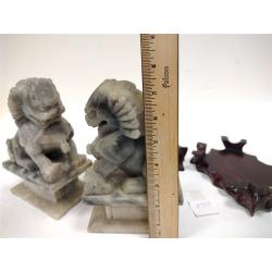 PAIR OF ANTIQUE STONE FOO LIONS WITH WOOD STANDS, one broken