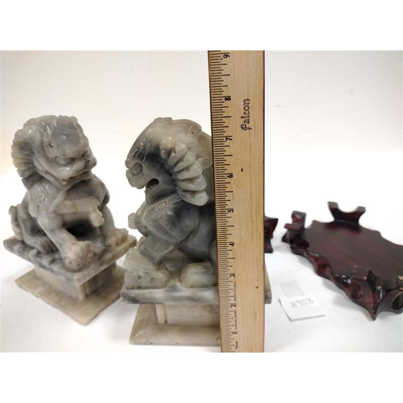 PAIR OF ANTIQUE STONE FOO LIONS WITH WOOD STANDS, one broken