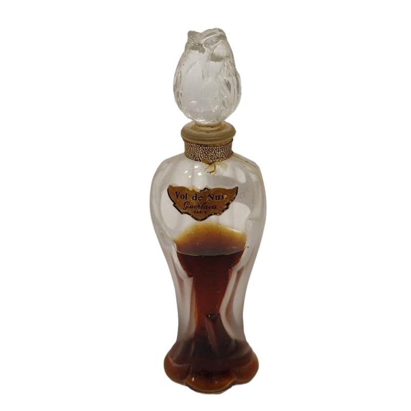 vol de nuit guerlain French perfume bottle with some contents