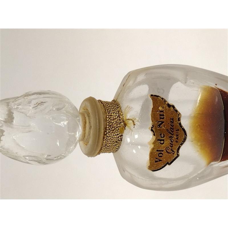 vol de nuit guerlain French perfume bottle with some contents