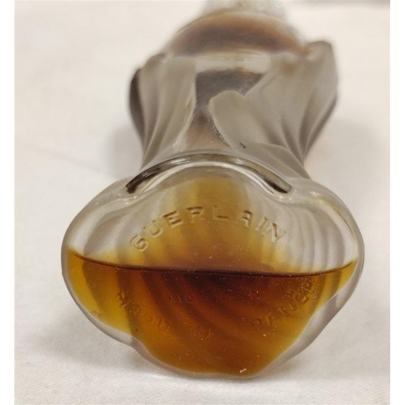 vol de nuit guerlain French perfume bottle with some contents