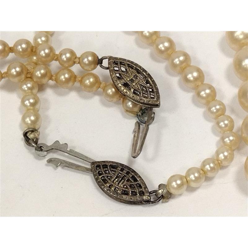 TWO ANTIQUE FAUX PEARL NECKLACES WITH STERLING CLASPS & OLD CLOTH HOLDERS