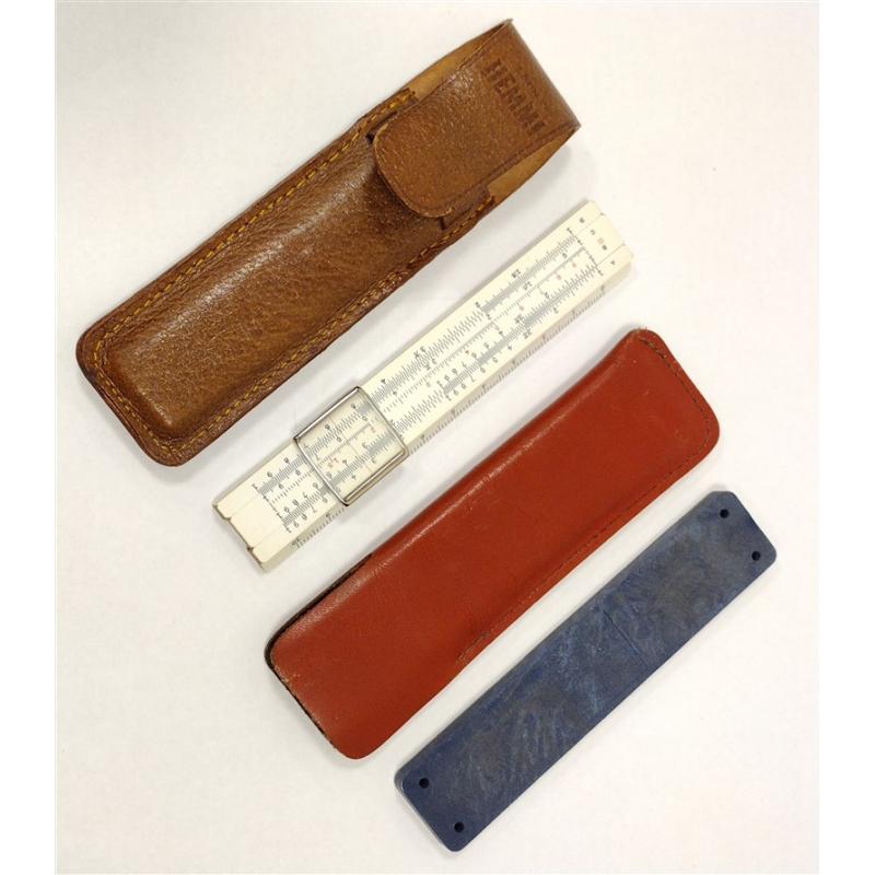 SMALL SLIDE RULE AND A SHARPENER