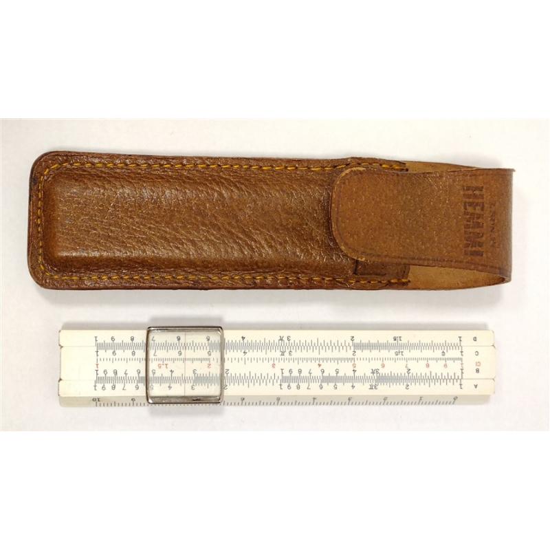 SMALL SLIDE RULE AND A SHARPENER