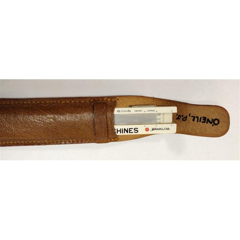 SMALL SLIDE RULE AND A SHARPENER
