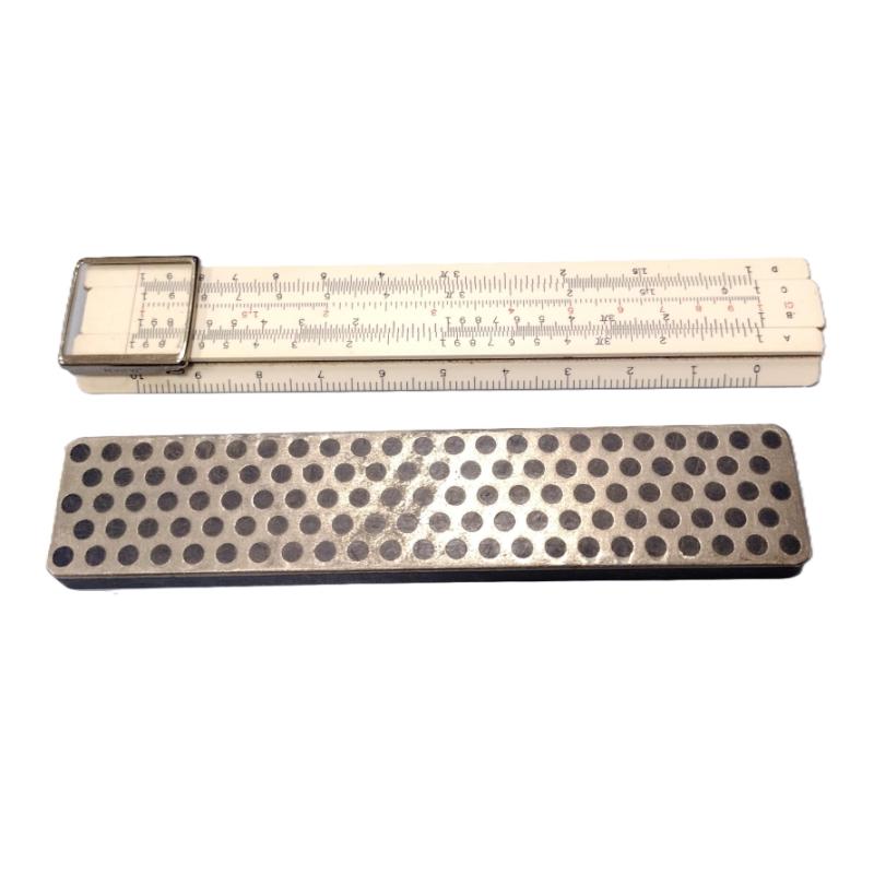 SMALL SLIDE RULE AND A SHARPENER