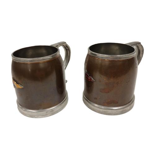 PAIR OF MANNING, BOWMAN GLASS BOTTOM COPPER STEINS