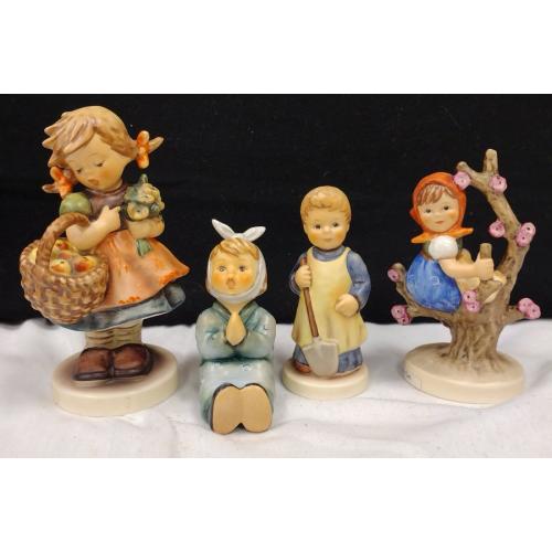 FOUR HUMMEL FIGURINES