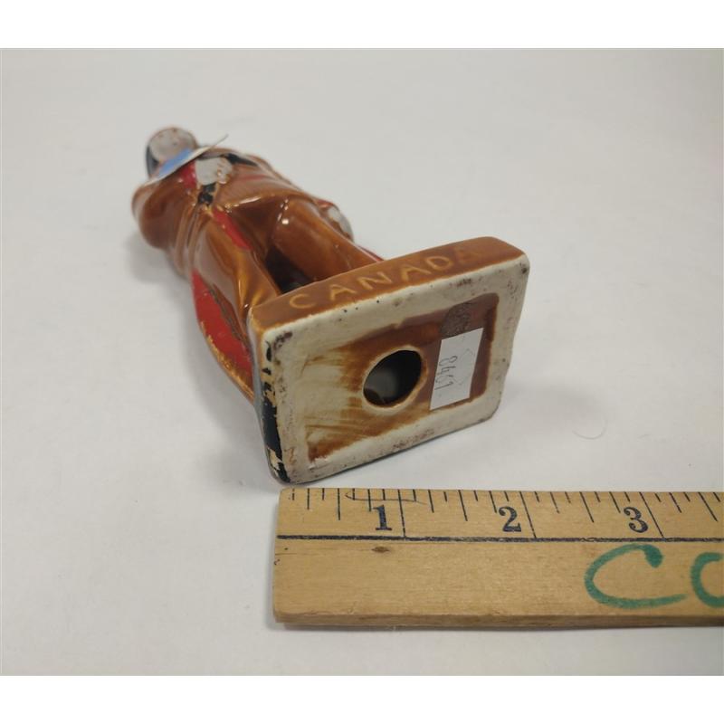 20TH CENTURY CANADA CERAMIC "INDIAN" SOUVENIR FIGURE.