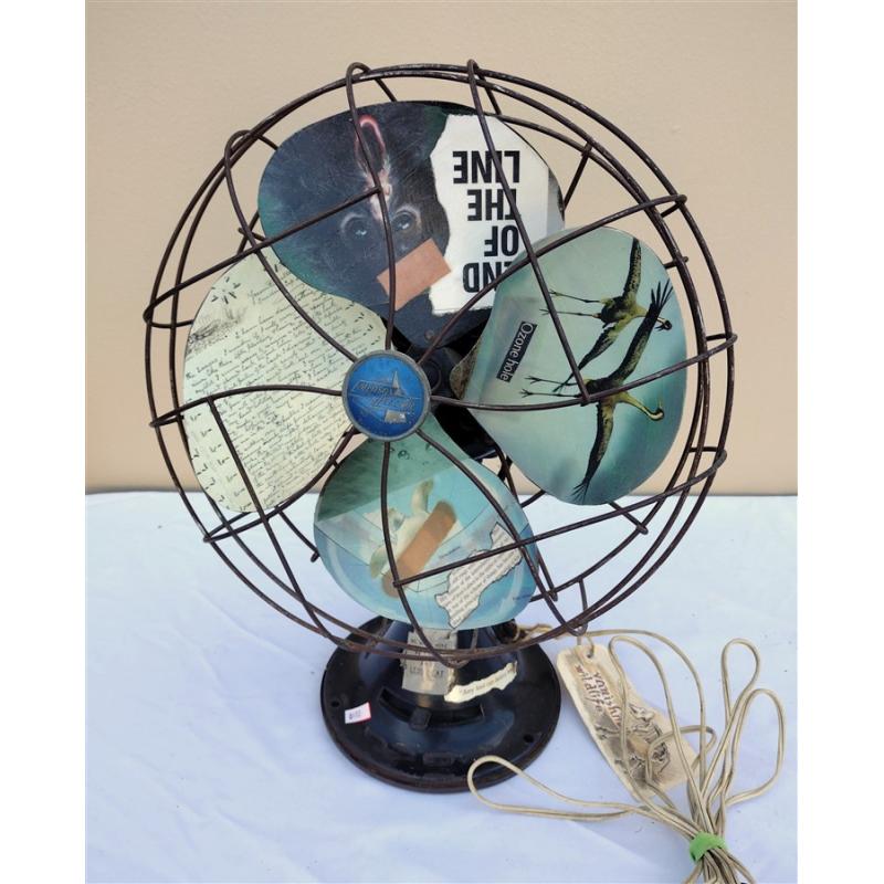 VINTAGE METAL TABLE FAN REPURPOSED INTO A DECORATIVE ART PIECE